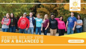 College Students standing in a group smiling